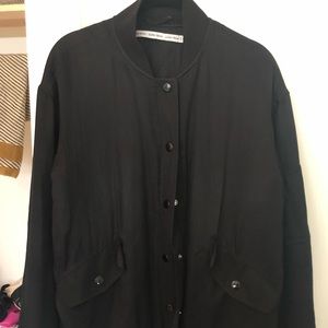 Snap up black smooth bomber college jacket